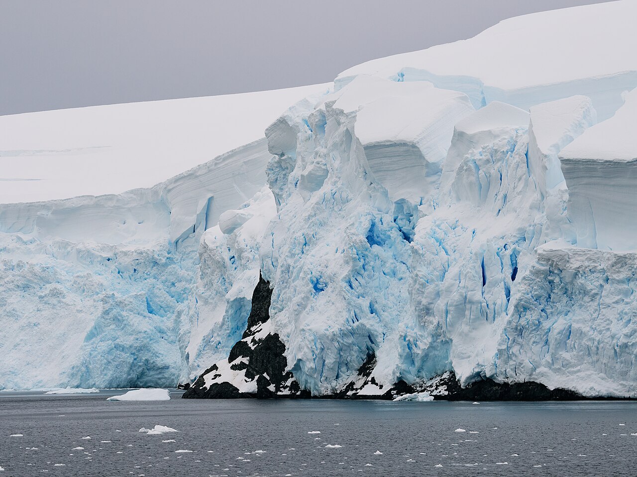The amazing textures of the glaciers with the blue ice that forms when the snow gets compacted over many years.