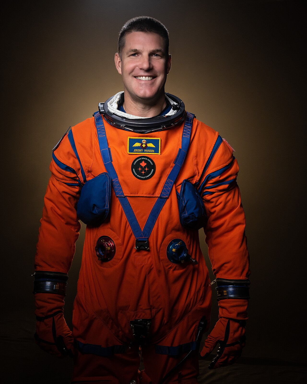 Jeremy Hansen in Orion Crew Survival System suit with Canadian Space Agency insignia